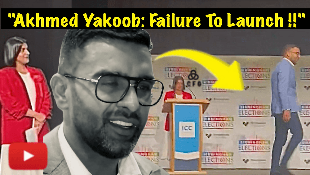 Akmed Yakoob walking off stage having lost the election